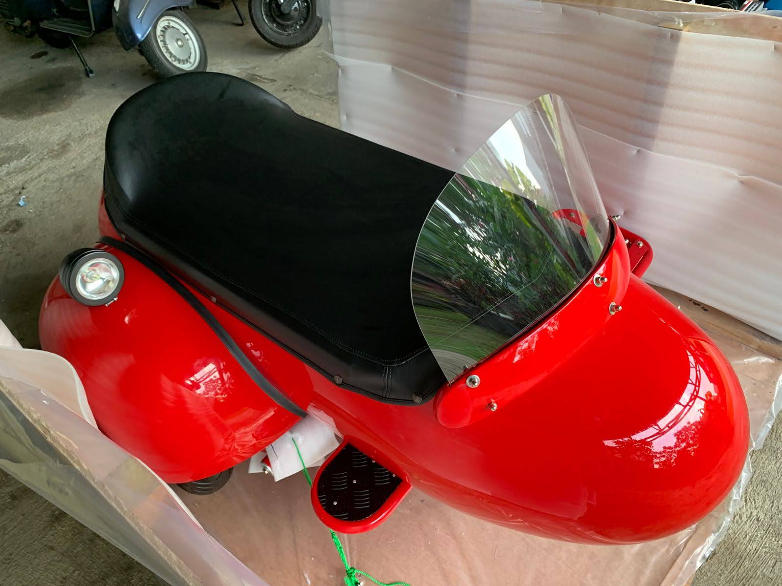 detail tie‑down and steering damper mount in crate – fiberglass custom Vespa sidecar